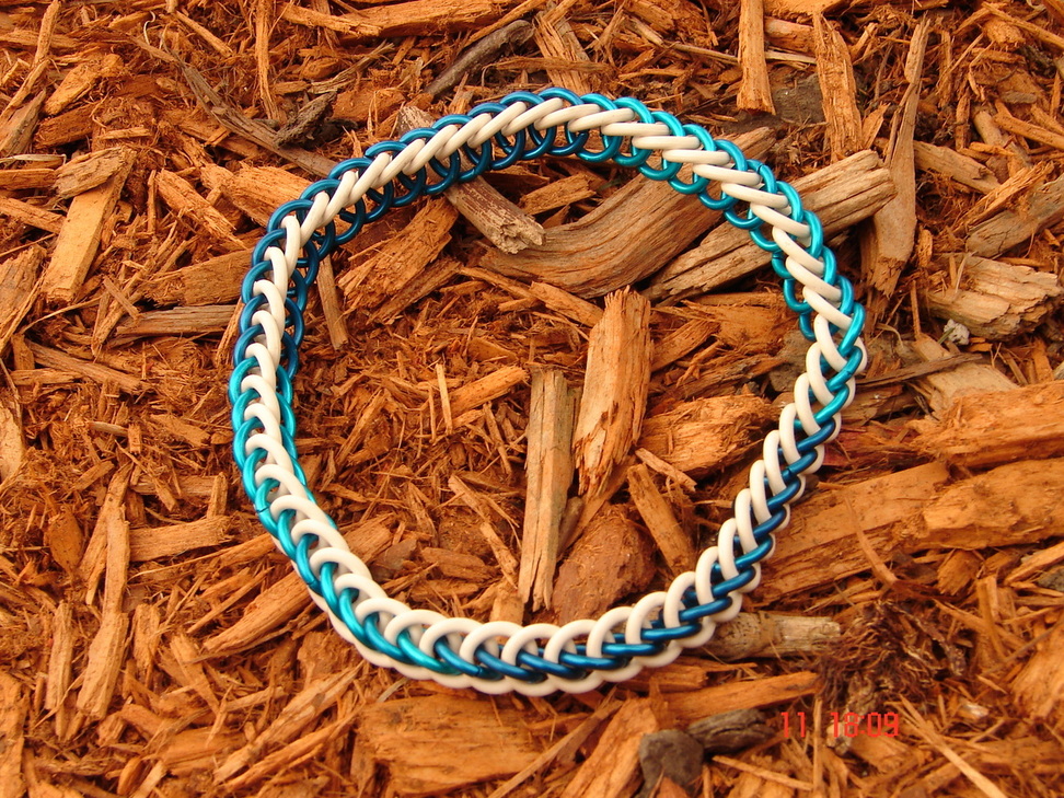 Steph's anklet on cedar mulch