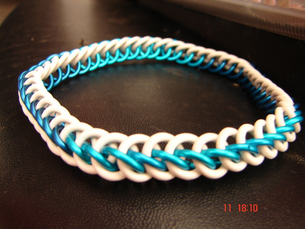 Steph's anklet on a black piece of plastic